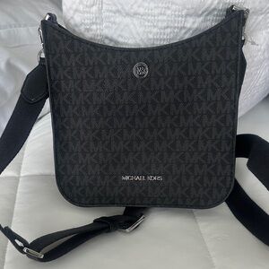 Authentic Michael Kors Black MK Signature small Messenger Bag silver hardware